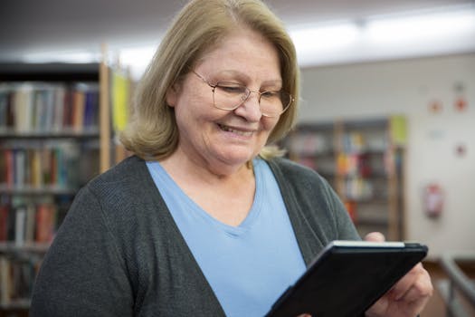 image of a person using educational apps on a tablet