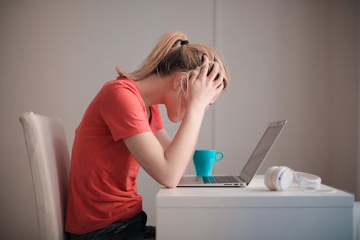 person studying with a laptop