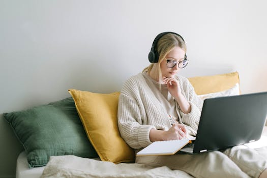 image of a learner taking notes online