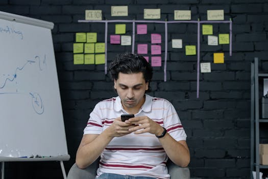 a person using a project management app on a phone