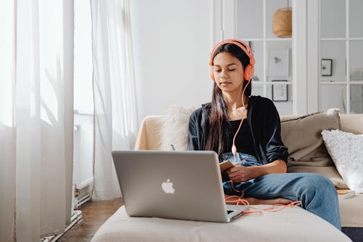 person studying online in a cozy space